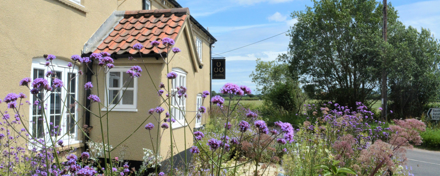 The Three Horseshoes pub in Briston view of the pub restaurant from the road