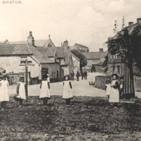 An historic photograph of Church Street in Briston